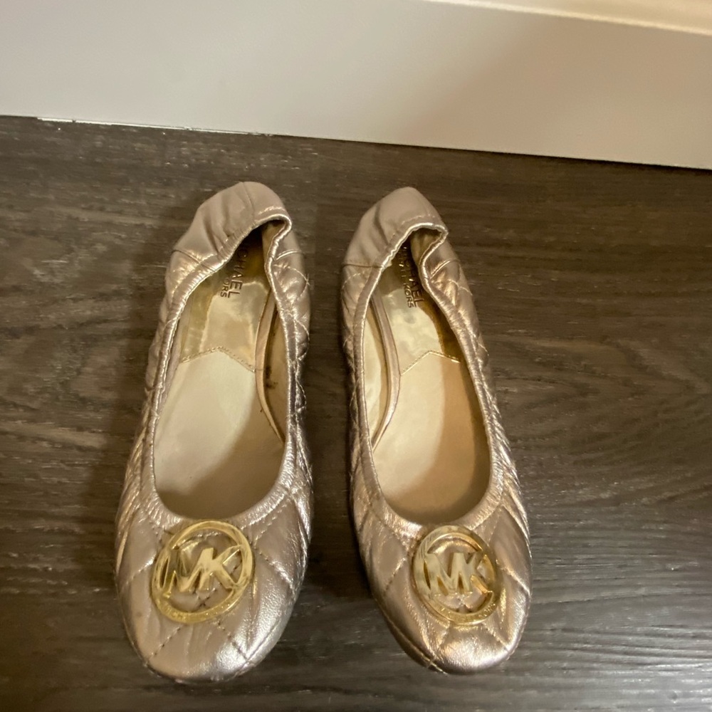 Michael Kors flats in rose gold